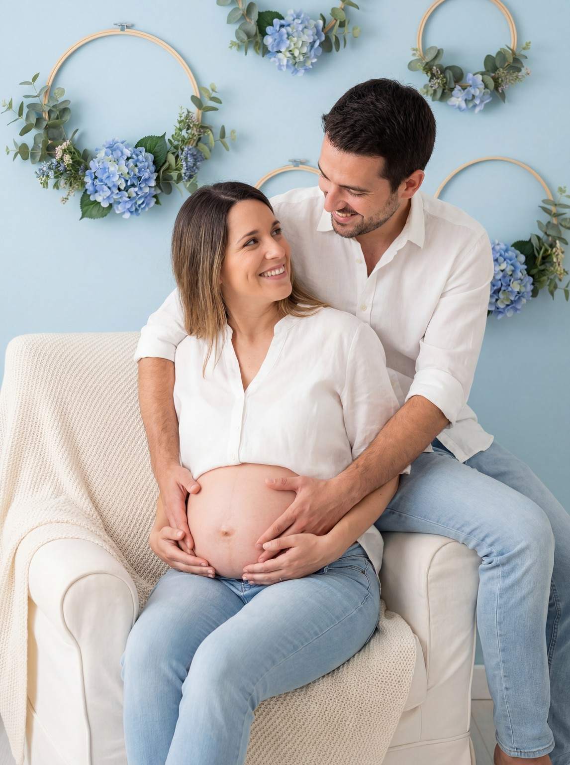 couple studio pregnant belly exposed