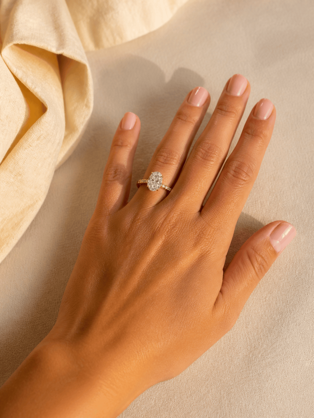 Virtual engagement ring try on with an oval diamond and gold band